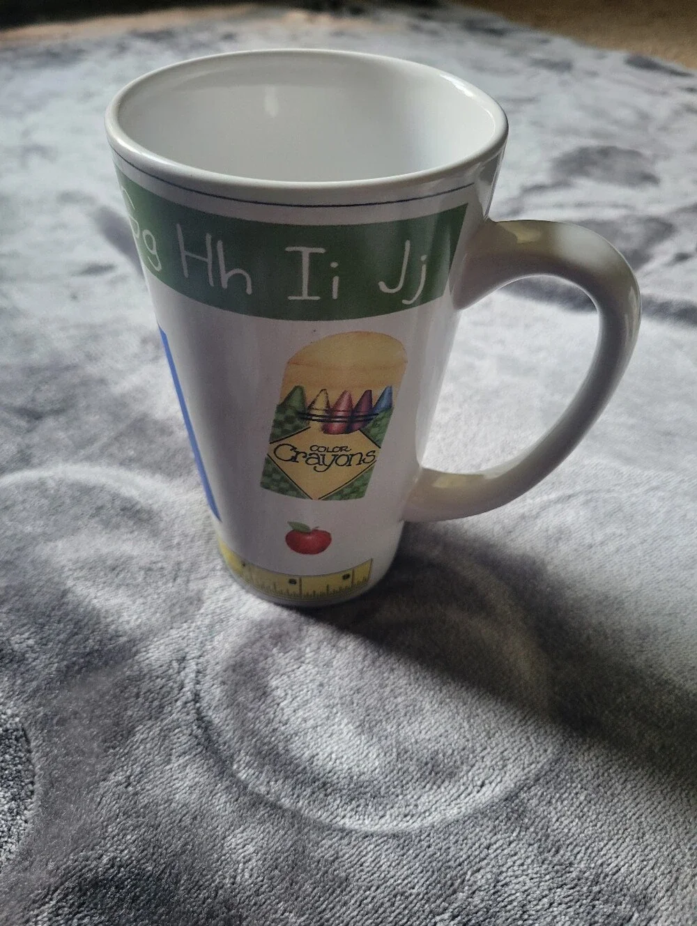Beautiful cup with school-themed designs